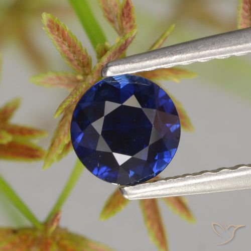0.66ct طبيعي أزرق غامق زفير, دائري, قليلا جدا