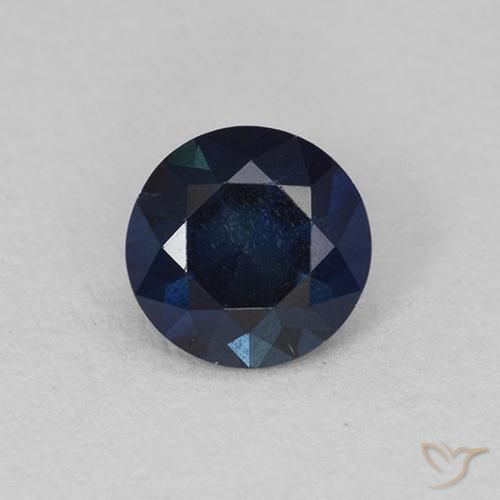 0.62ct طبيعي أزرق غامق زفير, دائري, قليلا جدا
