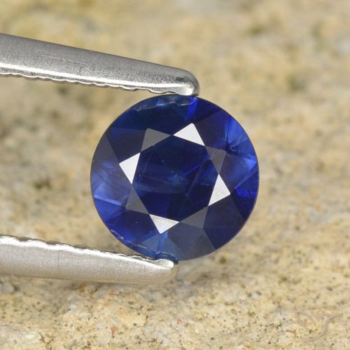 0.57ct طبيعي أزرق غامق زفير, دائري, قليلا جدا