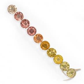 أحجار ياقوت أزرق متعدد الألوان طبيعية، قصة دائرى، قليلا جدا، وزنها 3.57 قيراط