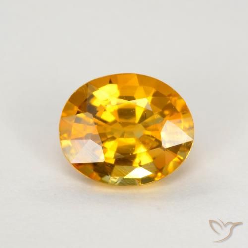 0.74ct طبيعي برتقالى متوسط زفير, بيضوي, قليلا جدا