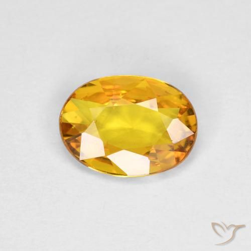 0.69ct طبيعي ذهبي زفير, بيضوي, قليلا جدا