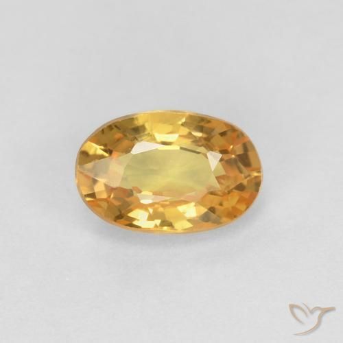 0.70ct طبيعي برتقالى ذهبى غامق زفير, بيضوي, قليلا جدا