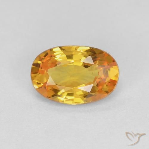 0.60ct طبيعي ذهبي زفير, بيضوي, قليلا جدا
