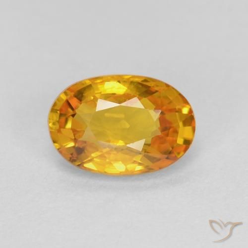 0.70ct طبيعي ذهبى-برتقالى متوسط زفير, بيضوي, قليلا جدا