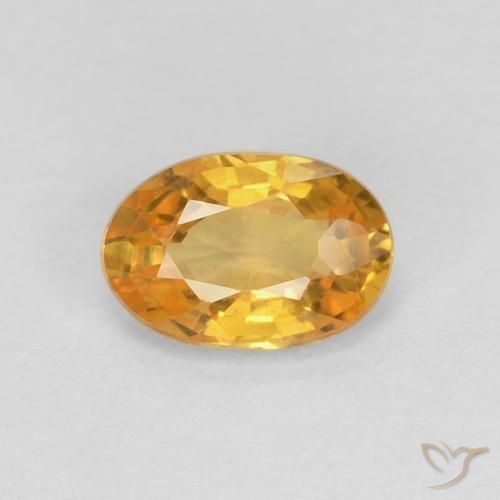 0.56ct طبيعي برتقالى ذهبى غامق زفير, بيضوي, قليلا جدا