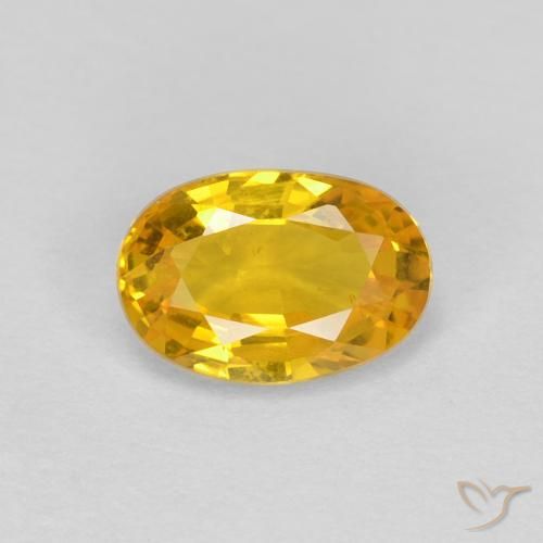 0.60ct طبيعي ذهبي زفير, بيضوي, قليلا جدا