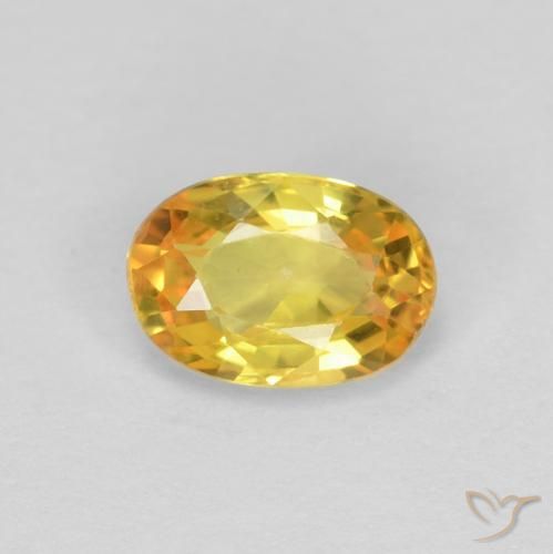 0.57ct طبيعي ذهبي زفير, بيضوي, قليلا جدا