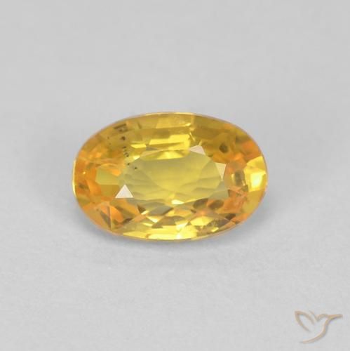 0.62ct طبيعي ذهبي زفير, بيضوي, قليلا جدا