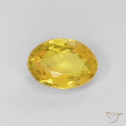 0.56ct طبيعي أصفر متوسط زفير, بيضوي, قليلا جدا