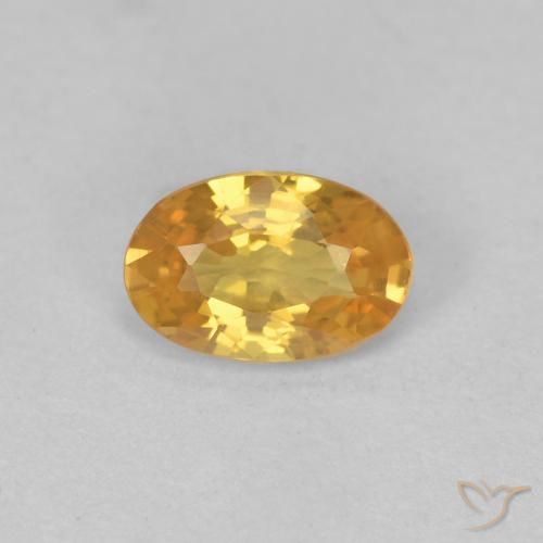 0.57ct طبيعي برتقالى ذهبى غامق زفير, بيضوي, قليلا جدا