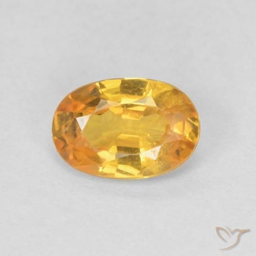 0.56ct طبيعي برتقالى-ذهبى زفير, بيضوي, قليلا جدا
