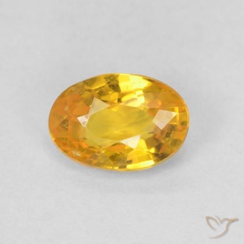 0.61ct طبيعي برتقالى متوسط زفير, بيضوي, قليلا جدا