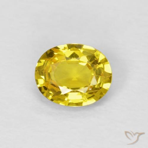 0.64ct طبيعي أصفر متوسط زفير, بيضوي, قليلا جدا