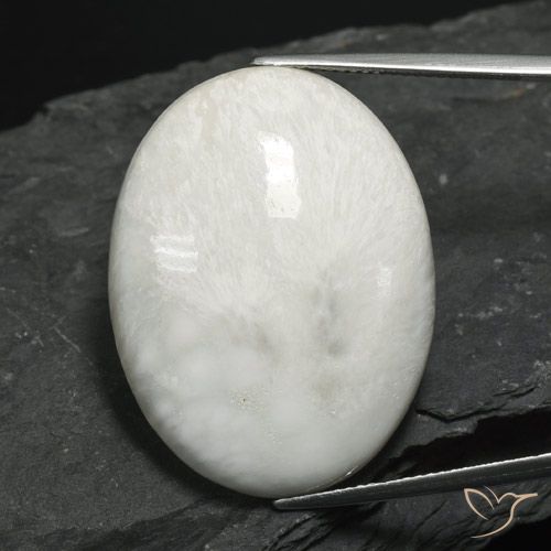 27.94ct طبيعي أبيض رمادى فاتح سكوليسيت, بيضوي, غير شفاف