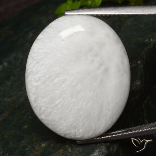 25.71ct طبيعي أبيص فاتح سكوليسيت, بيضوي, غير شفاف