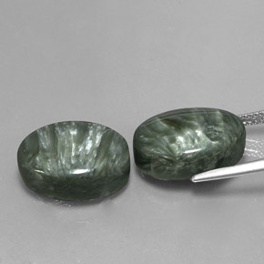 أحجار سيرافينيت أخضر طبيعية، قصة بيضاوى، غير شفاف، وزنها  قيراط