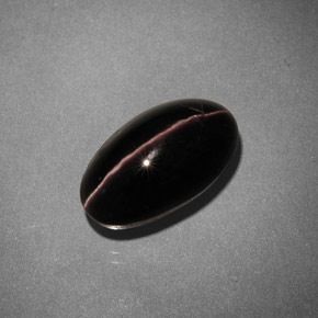 Sillimanite Cat's Eye طبيعي بلون بني، وزن ‎5.42‎ قيراط، شكل بيضاوى، مقاس ‎12.6x7.2‎ مم