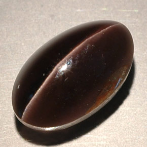 Sillimanite Cat's Eye طبيعي بلون بني، وزن ‎4.63‎ قيراط، شكل شفاف، مقاس ‎11.2x6.8‎ مم