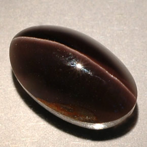 Sillimanite Cat's Eye طبيعي بلون بني، وزن ‎4.63‎ قيراط، شكل شفاف، مقاس ‎11.2x6.8‎ مم
