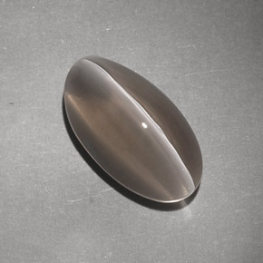 Sillimanite Cat's Eye طبيعي بلون بني، وزن ‎7.02‎ قيراط، شكل شفاف، مقاس ‎14.8x8.2‎ مم