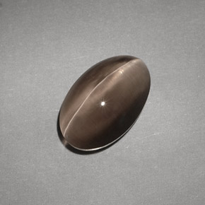 Sillimanite Cat's Eye طبيعي بلون بني، وزن ‎4.88‎ قيراط، شكل شفاف، مقاس ‎12.1x7.7‎ مم