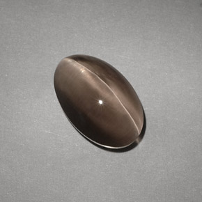 Sillimanite Cat's Eye طبيعي بلون بني، وزن ‎4.88‎ قيراط، شكل شفاف، مقاس ‎12.1x7.7‎ مم