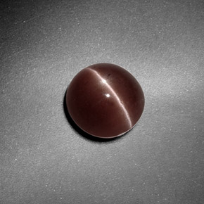 Sillimanite Cat's Eye طبيعي بلون بني، وزن ‎1.82‎ قيراط، شكل دائري، مقاس ‎7.32‎ مم