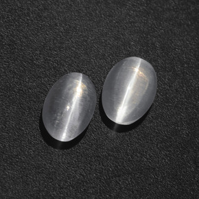 أحجار عين القط سيليمانايت دخان طبيعية، قصة بيضاوى، نصف شفاف، وزنها  قيراط