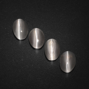 Sillimanite Cat's Eye طبيعي بلون دخاني، وزن ‎‎ قيراط، شكل بيضاوى، مقاس ‎7.1x4.6‎ مم
