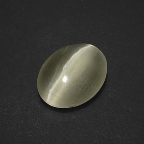 Sillimanite Cat's Eye طبيعي بلون بني رمادي، وزن ‎3.01‎ قيراط، شكل بيضاوى، مقاس ‎10.9x8.5‎ مم