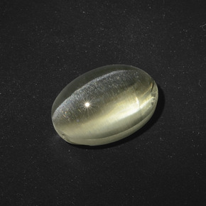 Sillimanite Cat's Eye طبيعي بلون بني رمادي، وزن ‎5.56‎ قيراط، شكل بيضاوى، مقاس ‎11.8x8.1‎ مم