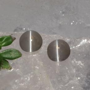 أحجار عين القط سيليمانايت دخان طبيعية، قصة بيضاوى، نصف شفاف، وزنها 1.15 قيراط