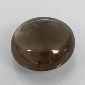 كوارتز دخاني طبيعي بلون بني مدخن، وزن ‎11.68‎ قيراط، شكل شفاف، مقاس ‎15.06‎ مم
