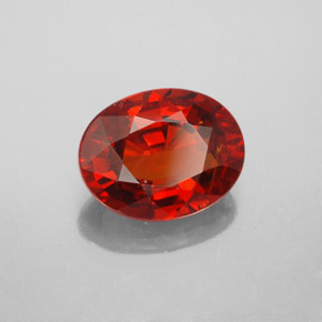 جارنيت سبيسارتايت طبيعي بلون برتقالي أحمر، وزن ‎3.36‎ قيراط، شكل بيضاوى، مقاس ‎10.2x8‎ مم