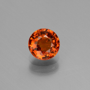 جارنيت سبيسارتايت طبيعي بلون برتقالي، وزن ‎0.87‎ قيراط، شكل دائري، مقاس ‎5.55‎ مم