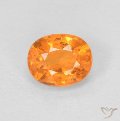 0.58ct طبيعي برتقالي زاهى غزل السبيسارتيت, بيضوي, قليلا جدا