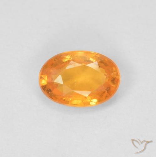 0.64ct طبيعي برتقالى كثيف غزل السبيسارتيت, بيضوي, قليلا جدا