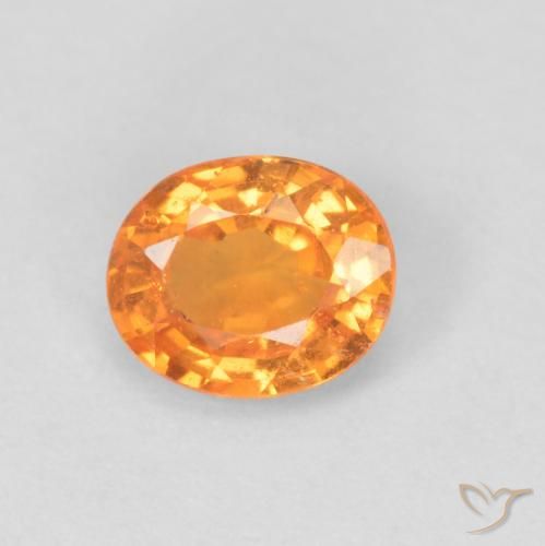 0.49ct طبيعي برتقالي زاهى غزل السبيسارتيت, بيضوي, قليلا جدا