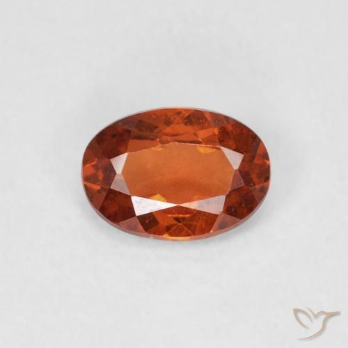 0.66ct طبيعي برتقالى نارى غزل السبيسارتيت, بيضوي, SI