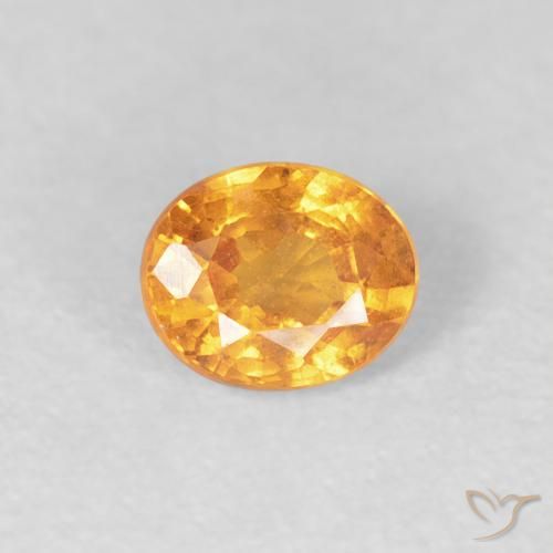 0.56ct طبيعي برتقالى كثيف غزل السبيسارتيت, بيضوي, قليلا جدا