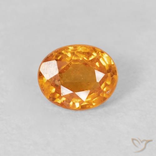 0.41ct طبيعي برتقالى مشمشى غزل السبيسارتيت, بيضوي, قليلا جدا
