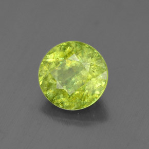سفين طبيعي بلون أخضر، وزن ‎1.76‎ قيراط، شكل دائري، مقاس ‎7.23‎ مم
