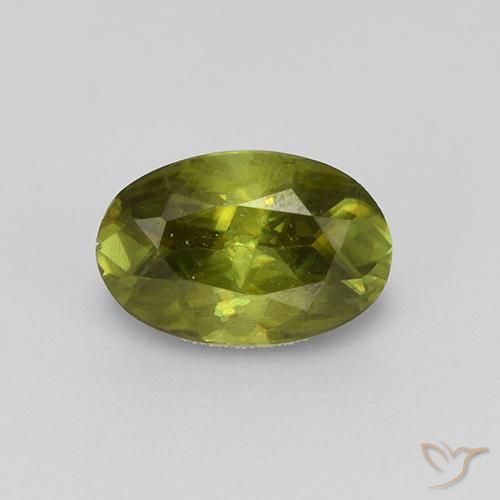 0.57ct طبيعي أخضر ترابى دافئ سيفين, بيضوي, قليلا جدا