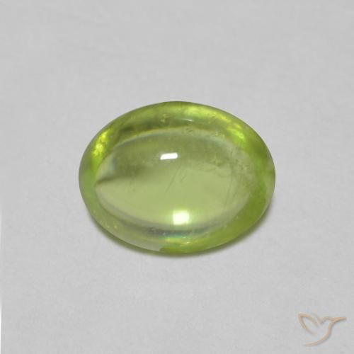 0.69ct طبيعي اخضر زاهى سيفين, بيضوي, شفاف