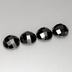 أحجار الإسبنيل أسود طبيعية، قصة دائرى، غير شفاف، وزنها  قيراط