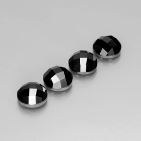 أحجار الإسبنيل أسود طبيعية، قصة دائرى، غير شفاف، وزنها 14.61 قيراط