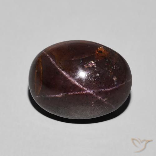 7.28ct طبيعي احمر غامق عقيق نجمى, بيضوي, غير شفاف