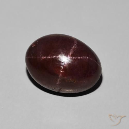 11.30ct طبيعي احمر غامق عقيق نجمى, بيضوي, غير شفاف