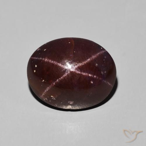 9.76ct طبيعي احمر غامق عقيق نجمى, بيضوي, غير شفاف